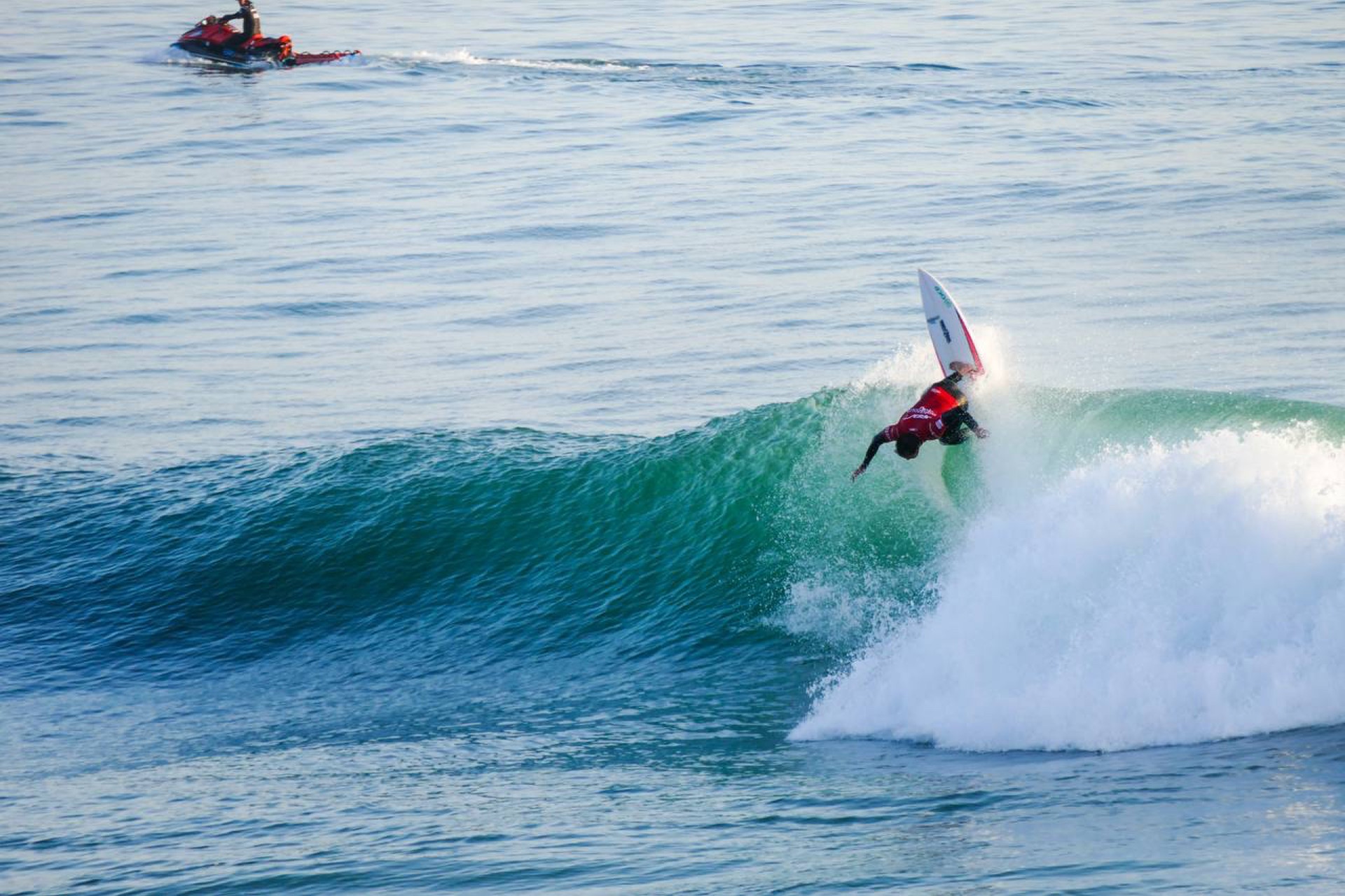 Surfer performing an aerial at Anchor Point, Taghazout